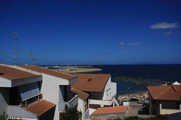 Location de vacances pour 8 personnes, avec balcon à Porto Torres