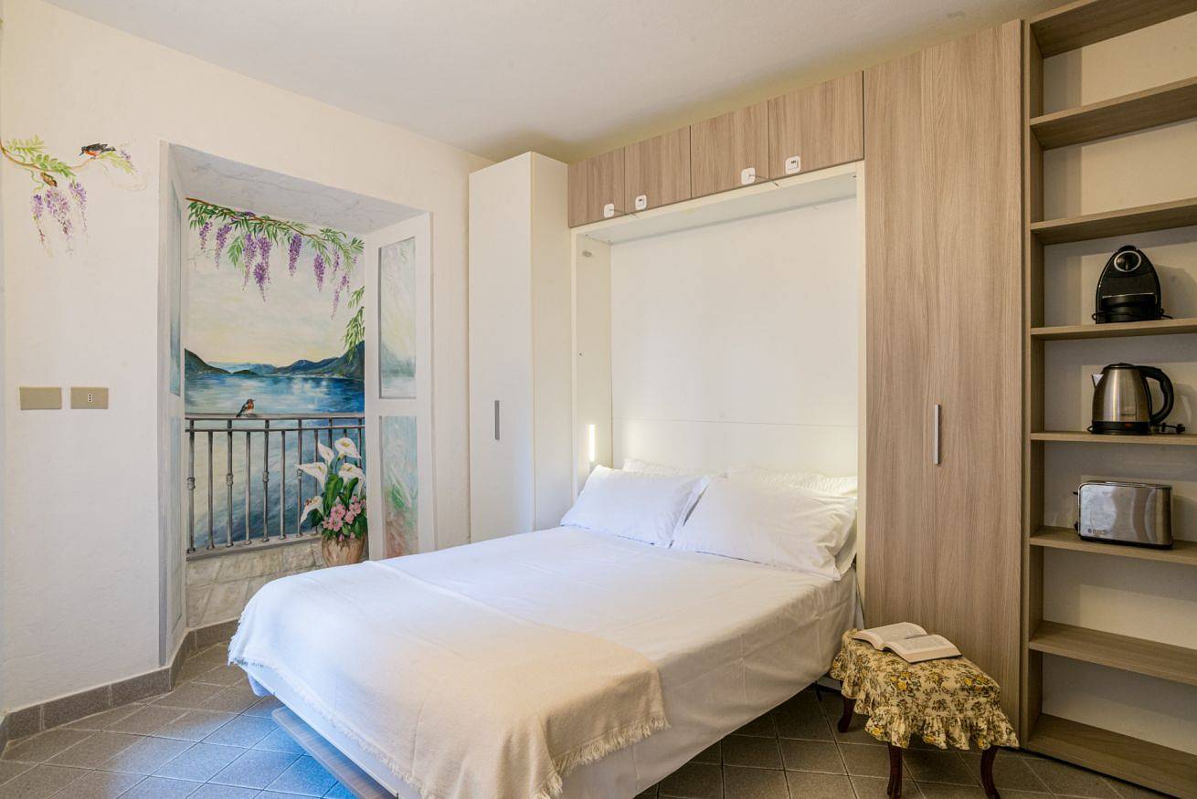 Appartamento intero, Guesthost - Wisteria Dreams - Comfy Studio-Flat in Argegno, Comune di Argegno