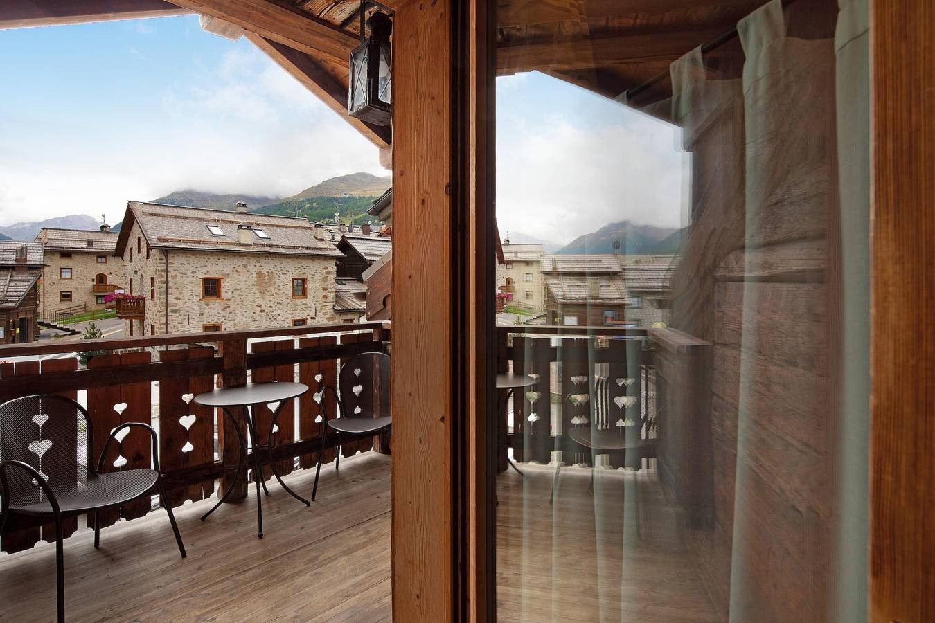 Appartement entier, Appartement 'Chalet Picchio Trilocale' avec vue sur les montagnes, balcon et Wi-Fi in Livigno (Town), Livigno