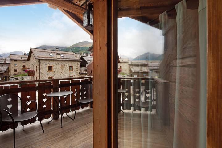 Ganze Wohnung, Ferienwohnung 'Chalet Picchio Trilocale' mit Bergblick, Balkon und Wlan in Livigno (Stadt), Livigno