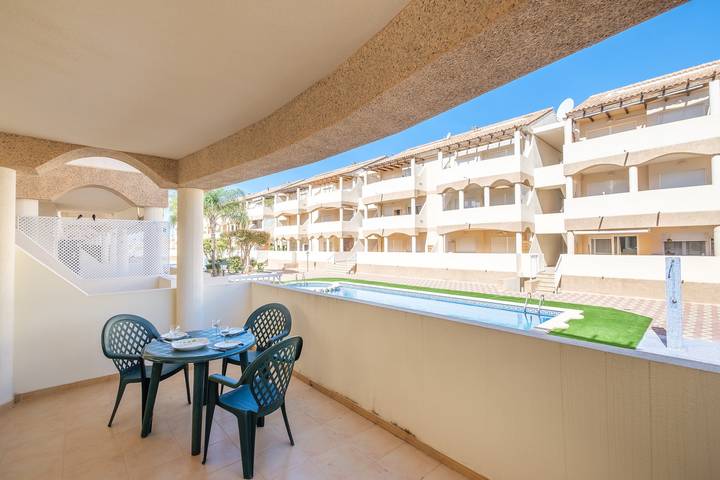 Apartamento entero, Apartamento "Playasol" con piscina compartida, terraza privada y A/C in Zona Triador, Vinaroz