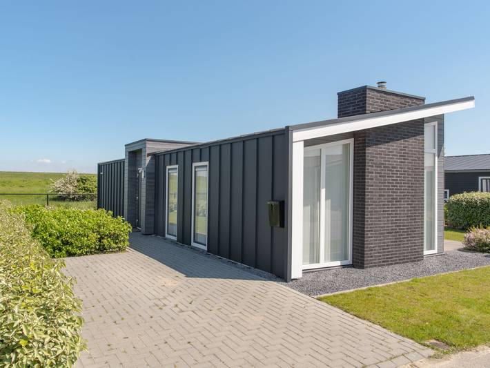Vacation rental for 4 people, with yard and terrace as well as view in Zeeland