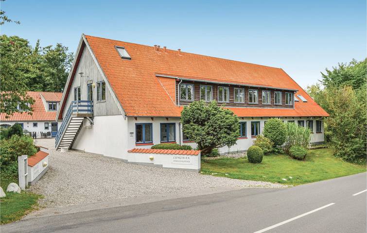 Ferienwohnung für 6 Personen, mit Sauna und Terrasse sowie Pool und Garten in Lyngsbæk Strand