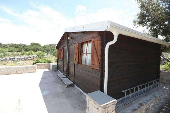 2-Zimmer-Haus mit Terrasse und Meerblick Bucht Mikavica, Žirje in Dalmatinische Inseln