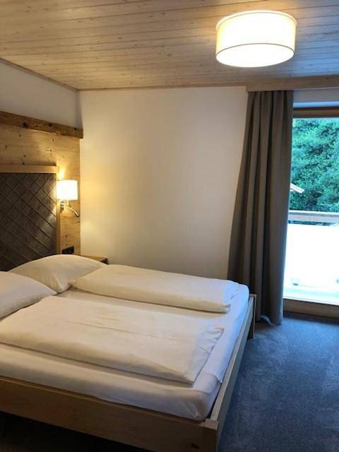 Ferienwohnung für 2 Personen, mit Seeblick und Sauna sowie Garten und Ausblick in Unterach am Attersee - 2