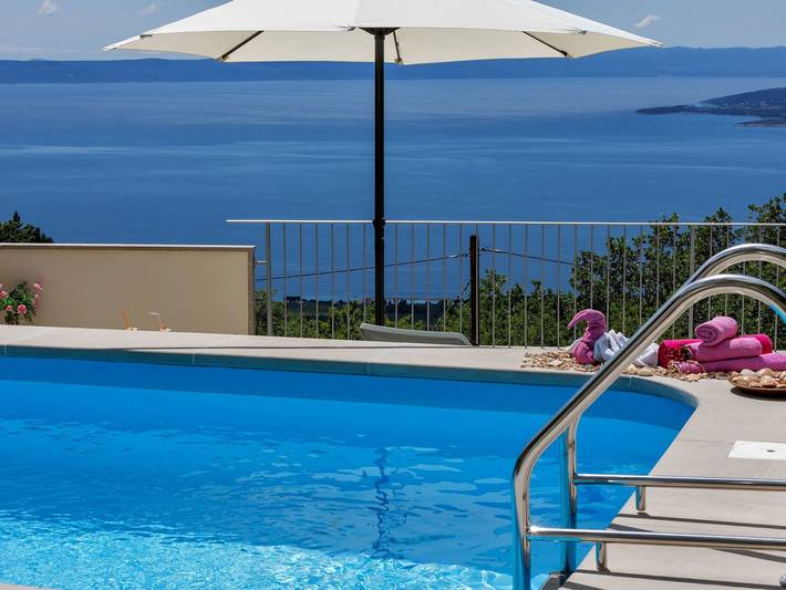 Ferienhaus für 4 Personen, mit Balkon und Garten