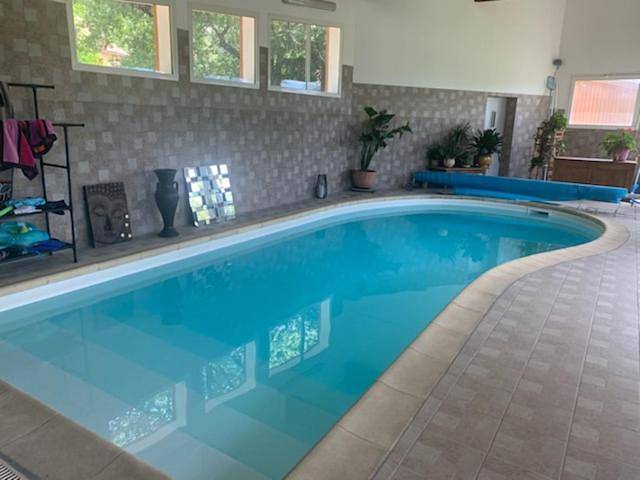 Appartement de vacances pour 2 personnes, avec Terrasse et Jardin ainsi que Piscine et Vue
