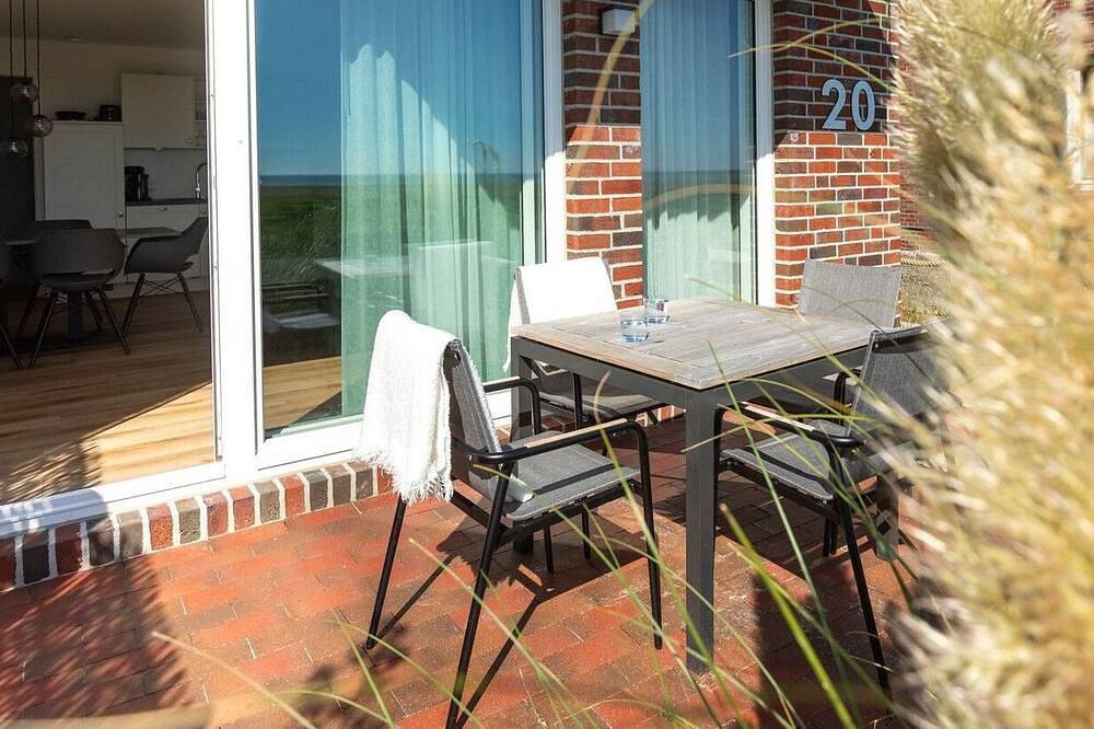 Familien- und hundefreundliche moderne Ferienwohnung mit Südterrasse am Watt — Bild 3