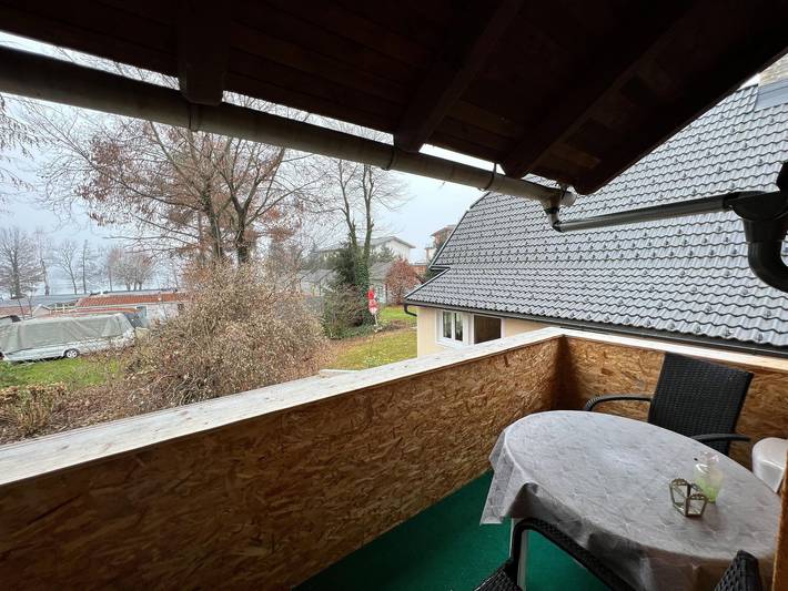 Ferienwohnung für 2 Personen, mit Balkon/Terrasse und Balkon sowie Garten und Seeblick