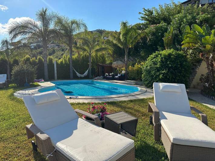 Casa vacanza per 4 persone, con giardino e panorama nonché vista lago e piscina, con animali domestici in Calabria
