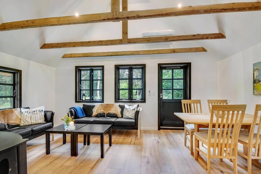 Modernised holiday home with woodburning stove, whirlpool and great wooden terrace in Vester Husby, Husby