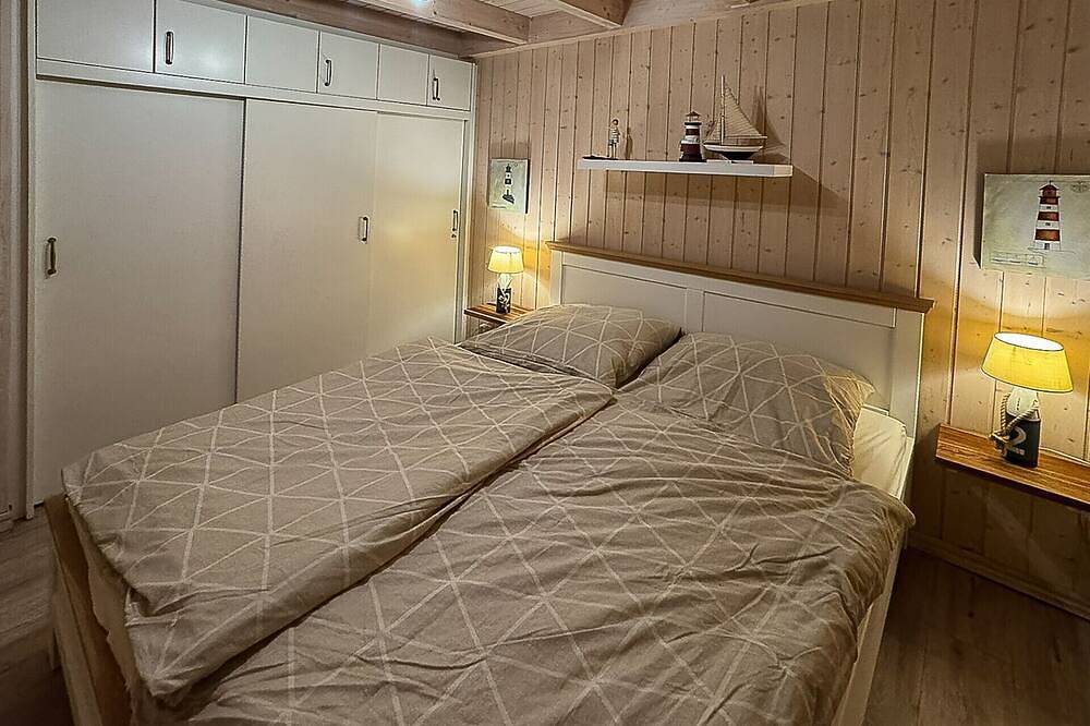Ferienhaus Villa Hügel 222 in Baabe mit Meerblick. Kinderfreundliche Ausstattung. Stilvolles Wellnessbad mit Sauna & Whirlpool. Ladestation für Elektroautos – ideal für eine komfortable Anreise in Strand Baabe, Baabe