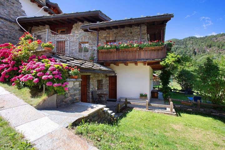 Chalet per 9 persone, con Balcone e Giardino in 