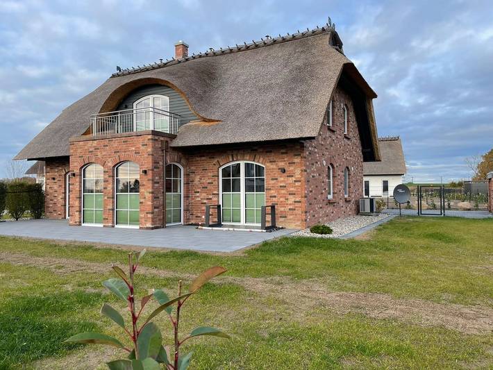 Ferienhaus für 8 Personen, mit Balkon und Terrasse sowie Garten und Ausblick in Poseritz
