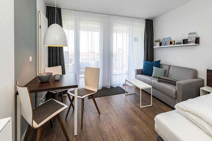 Ferienwohnung für 3 Personen, mit Sauna und Kinderpool sowie Balkon in Bensersiel