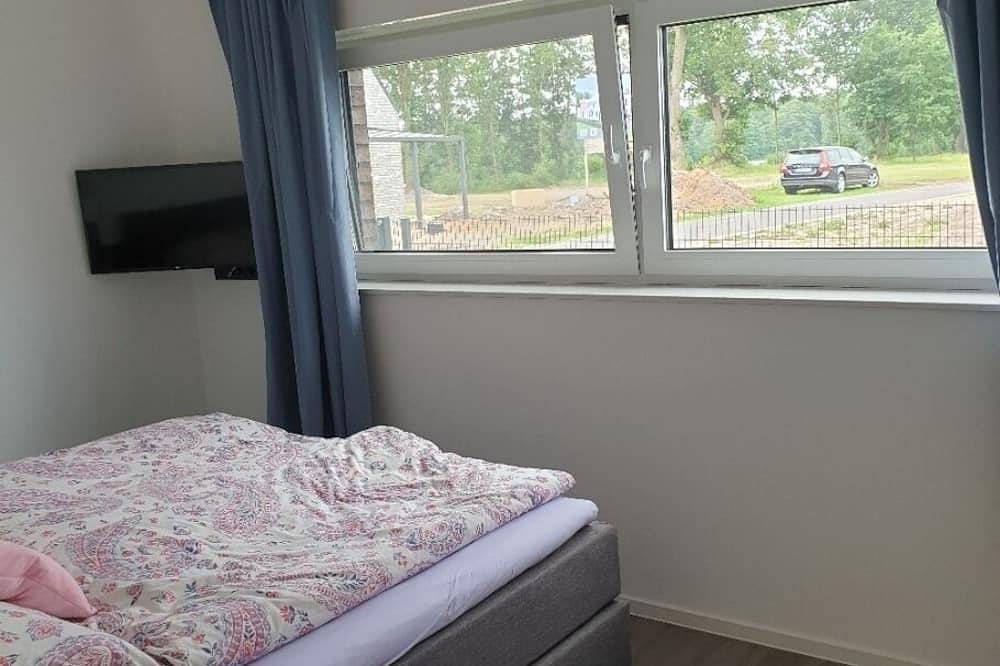 Ferienhaus direkt am See mit Sauna, Klimaanlage und privat Strand in Barßel, Oldenburger Münsterland