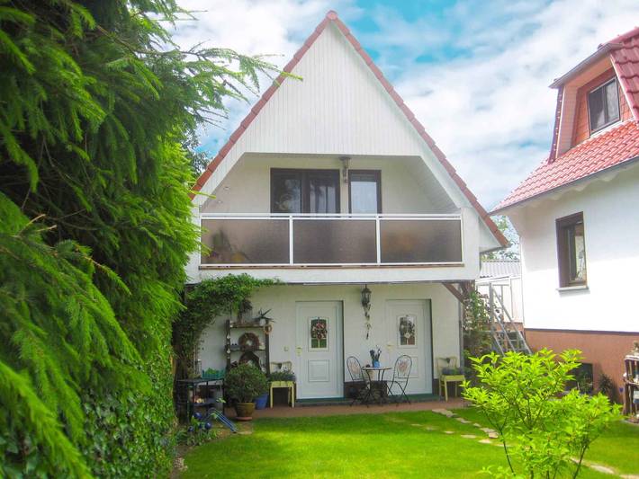 Ferienhaus für 4 Personen, mit Balkon und Garten