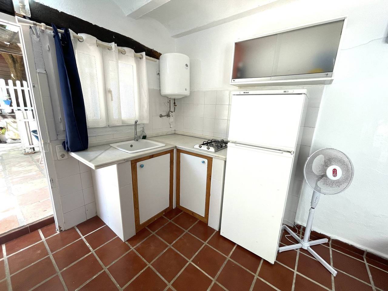 Casa con terrazza e accesso diretto a spiaggia semiprivata in Oliva, Costa Blanca