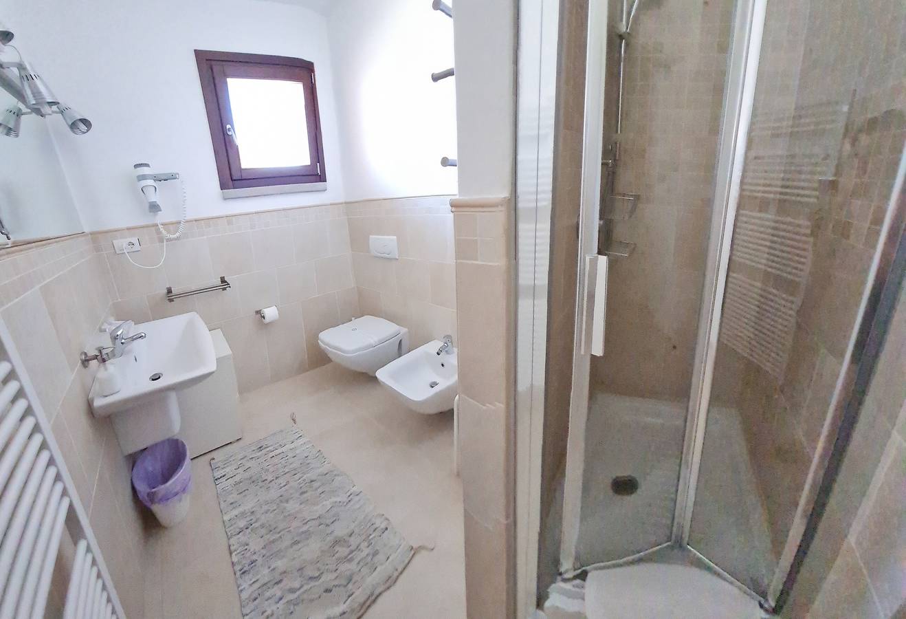 Appartement entier, Appartement 'C 210 Puntavilla' avec piscine commune, Wi-Fi et climatisation in Parco Nazionale dell'Arcipelago di La Maddalena, La Maddalena