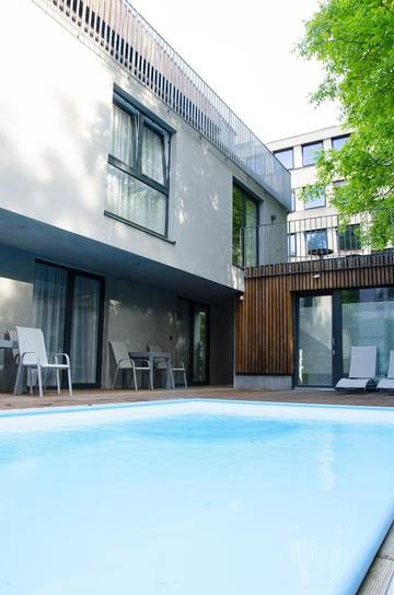 Ferienwohnung für 3 Personen, mit Balkon und Ausblick sowie Pool in Salzburg