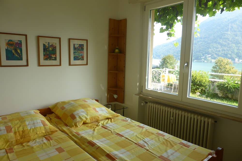 Ganze Wohnung, Casa Irene, App. mit Gartenterrasse, Privatstrand in Villaggio Montelago, Brusimpiano Gemeinde