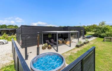 Ferienhaus für 16 Personen, mit Terrasse und Whirlpool sowie Garten und Sauna, mit Haustier in Djursland