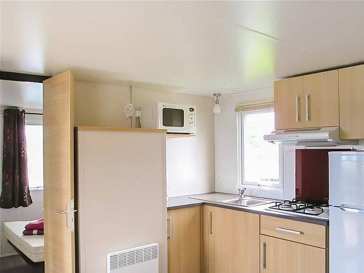 Mobil home pour 6 personnes, avec bassin pour enfant dans Bréhec - 4