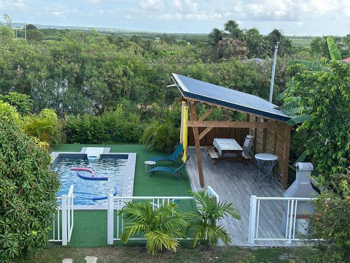 Appartement de vacances pour 4 personnes, avec jardin ainsi que piscine et vue