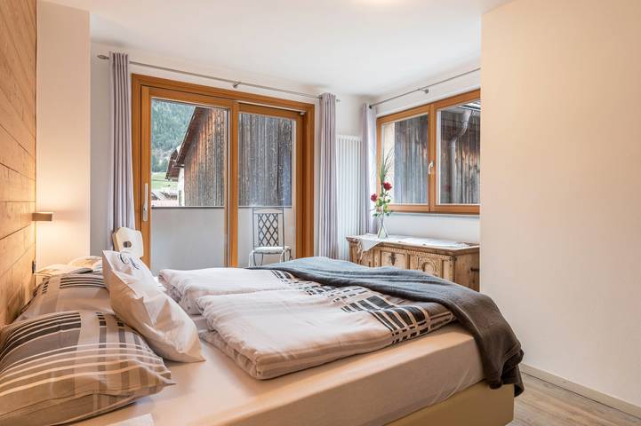 Appartamento per 7 persone, con Balcone e Giardino a Pozza di Fassa
