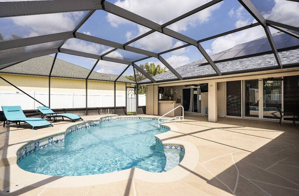 Entire home with pool for long and short stay. Fun for everyone. in Port St. Lucie, St. Lucie County