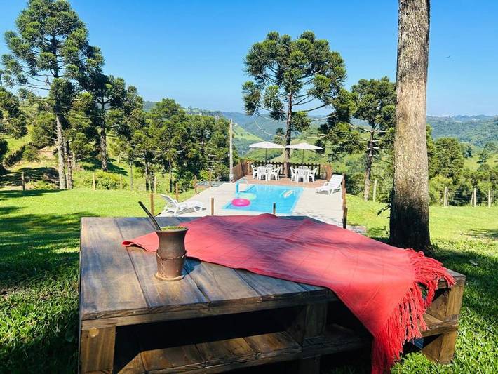 Casas e apartamentos de temporada para 8 pessoas, com balcão e vista e ainda piscina and jardim em Caxias do Sul