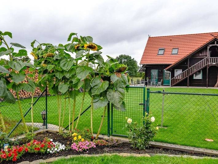 Ferienhaus für 4 Personen, mit Balkon und Terrasse sowie Garten