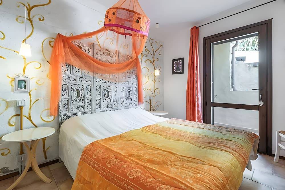 Apartamento entero, Apartamento 'La Luna Sulla Duna' con vistas al mar, terraza privada y aire acondicionado in Playa de Porto Pino, Porto Pino