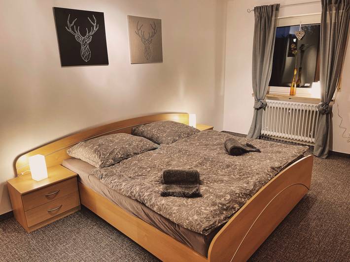 Ferienhaus für 7 Personen, mit Balkon und Garten