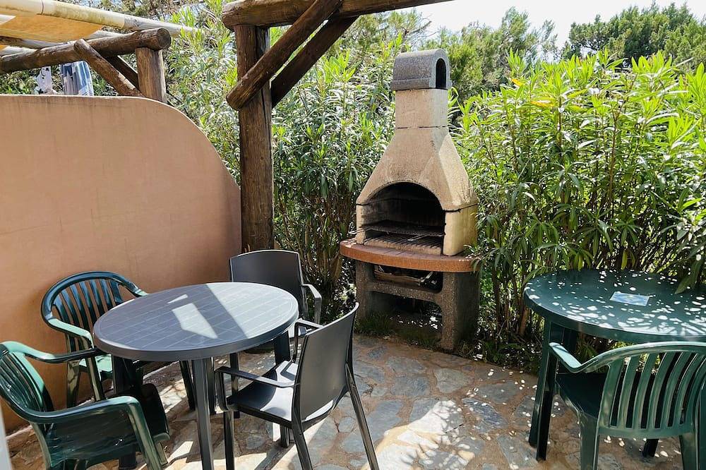 Mini villa dúplex con vistas al mar, terraza, barbacoa, a 5 minutos a pie de la playa de Santa Giulia in Santa Giulia, Porto Vecchio