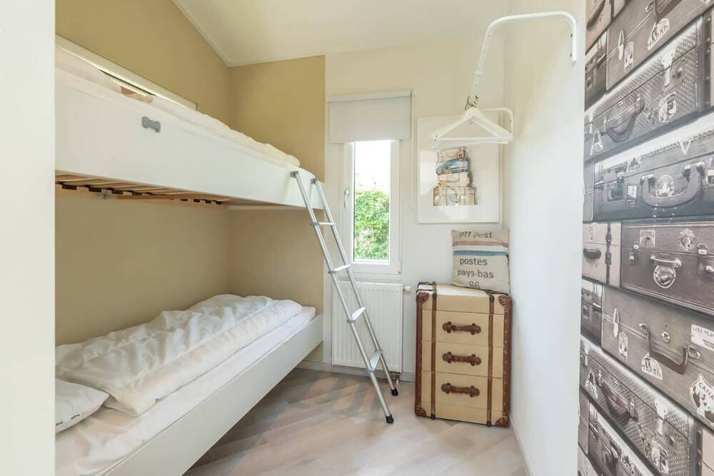 Chalet 'Der blaue Vogel' ist der ideale Ort für entspannte Ferien mit der Familie. in Burgh-Haamstede, Zeeuwse Kust