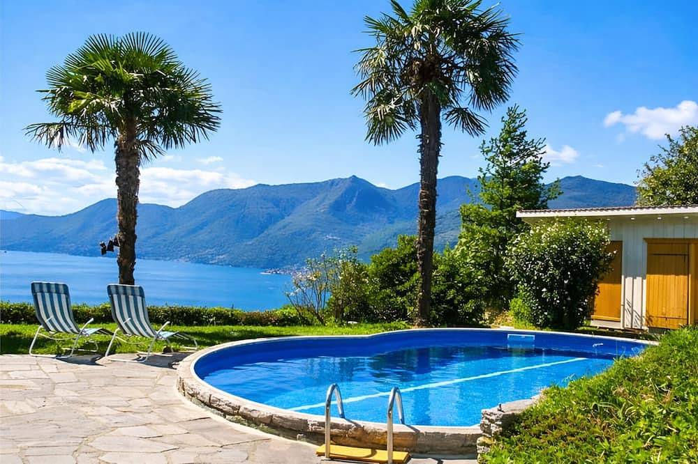 Freistehendes 4½-Zimmer-Haus mit Pool und atemberaubender Sicht auf den See in Gaggio (Agra), Agra
