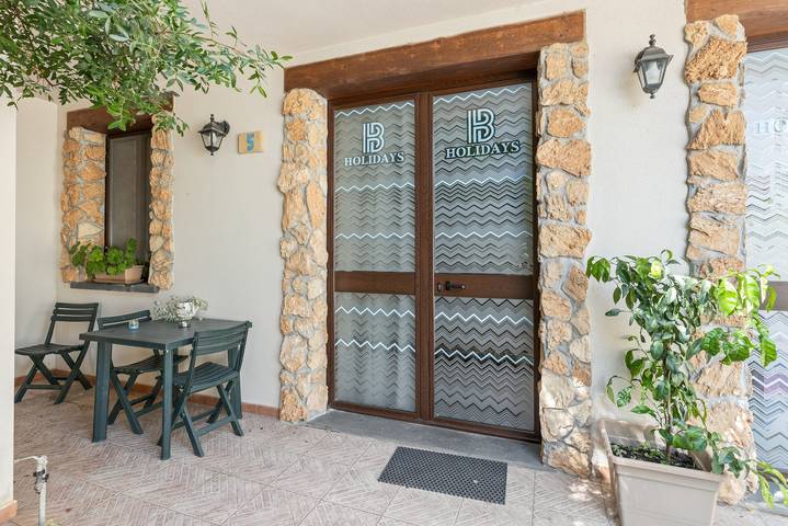 Gîte pour 4 personnes, avec jardin à Cabras