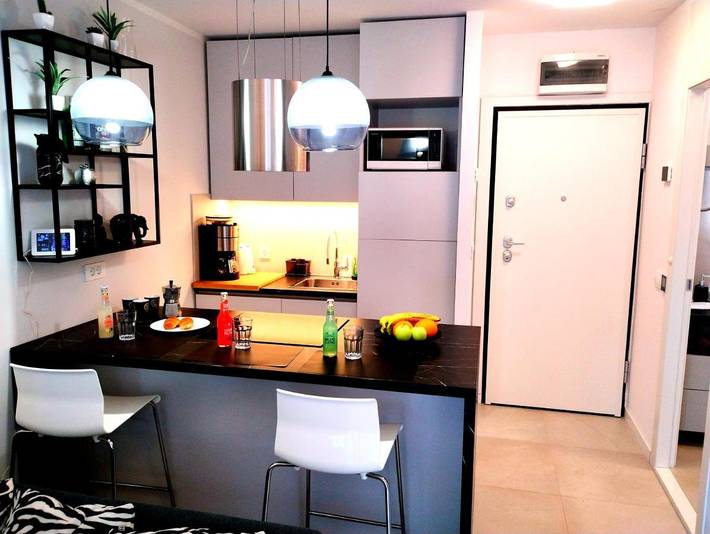 Ferienwohnung für 4 Personen, mit Balkon und Terrasse sowie Garten und Ausblick