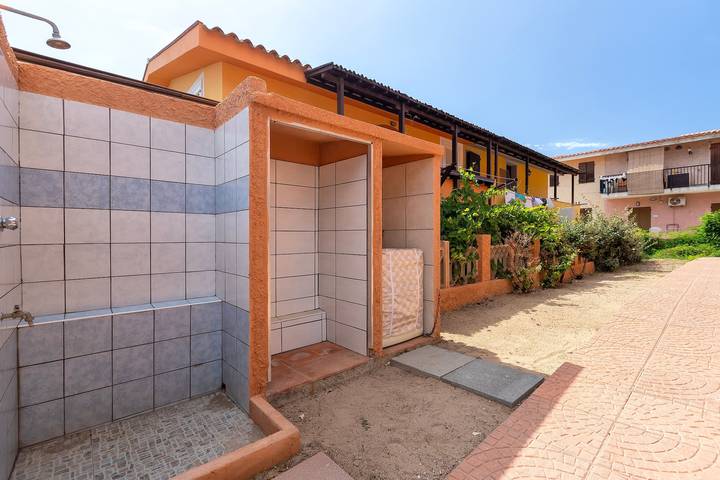 Appartement entier, Appartement 'Leoni' avec jardin privé et climatisation in Isola Rossa, Trinità d'Agultu e Vignola