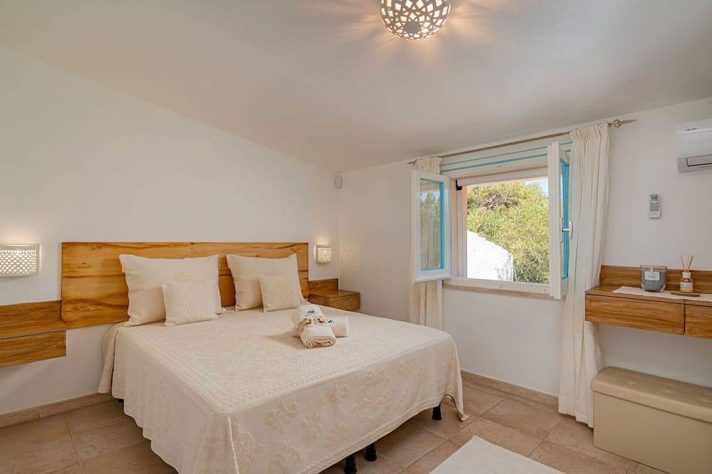 Wohnung in einem Ferienhaus mit Pool, Klimaanlage,  W-Lan, Tv, Innenhof, Haustiere erlaubt in Eden Beach, Sorso