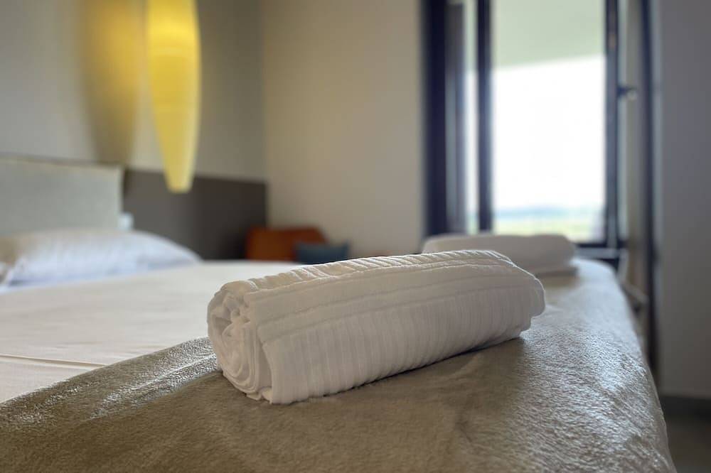 Apartamento entero, Apartamento 'Appartamento Mael' con jardín compartido, Wi-Fi y aire acondicionado in Valeggio sul Mincio, Provincia de Verona