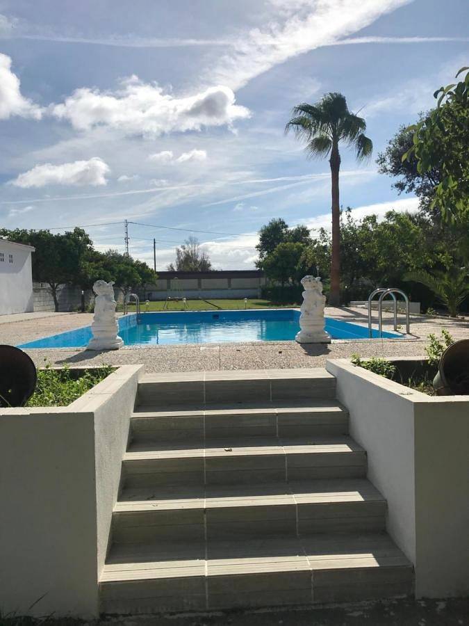 Casa para 11 personas, con Terraza además de Jardín y Piscina en Dos Hermanas