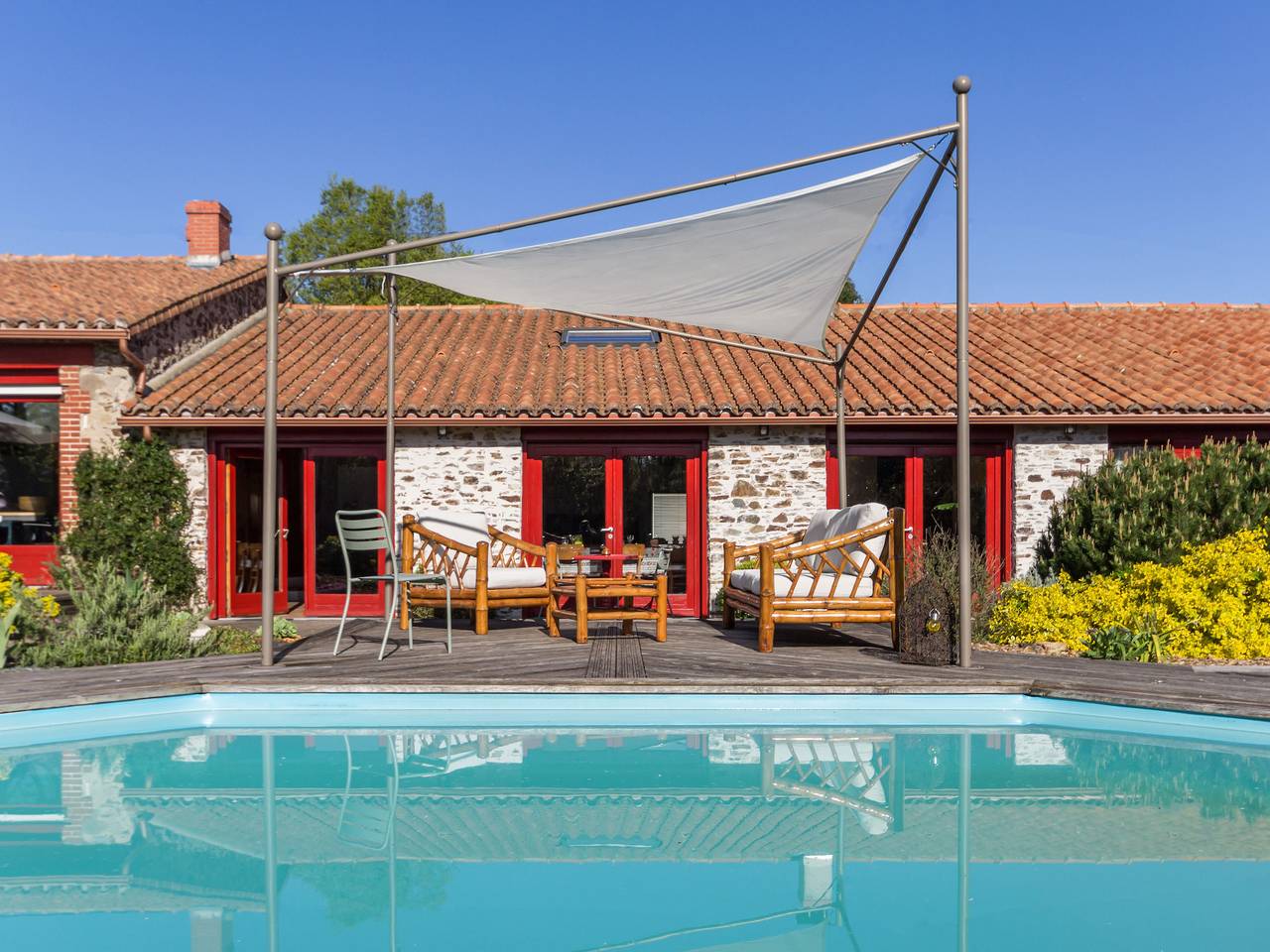 Spacious family lodge with natural pool, near Nantes in La Limouzinière, Nantes region