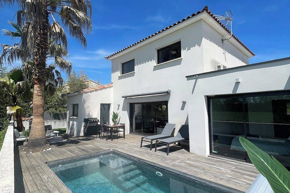 Villa familiale avec piscine et palmiers, entre mer et garrigue in Teyran, Côte méditerranéenne (France)