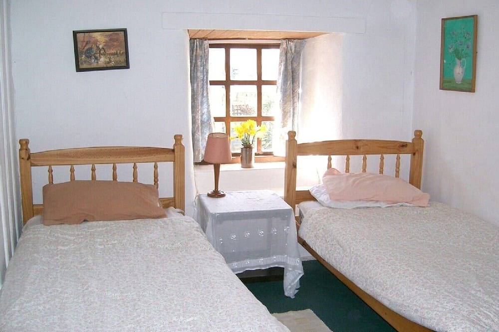 Historic beamed cottage near beach overlooking St Michael's Mount in Marazion, Cornwall