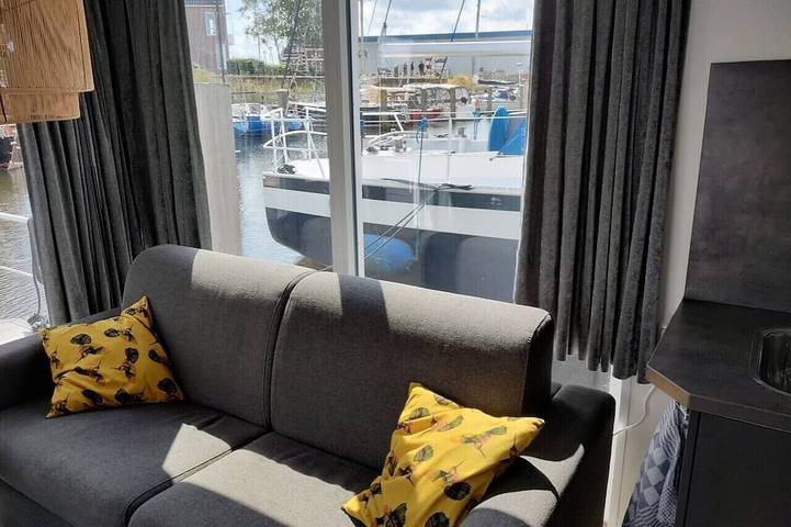 Houseboat Maatrollie in the harbor of Monnickendam in Monnickendam, Markermeer