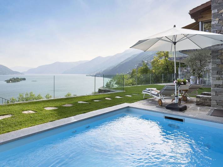 Chalet para 2 personas, con terraza además de vistas al lago y piscina en Suiza