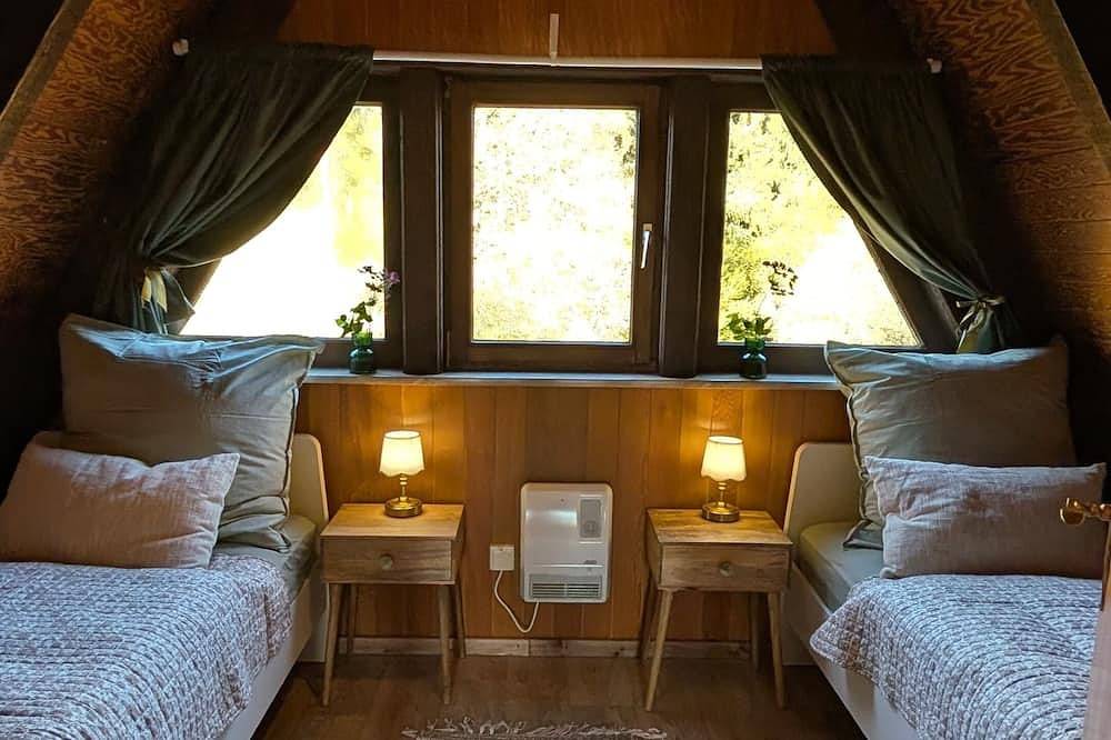 Livias Lodge - Nurdachhaus mit Sauna Terrasse und Garten am Wald in Wittingen, Landkreis Gifhorn