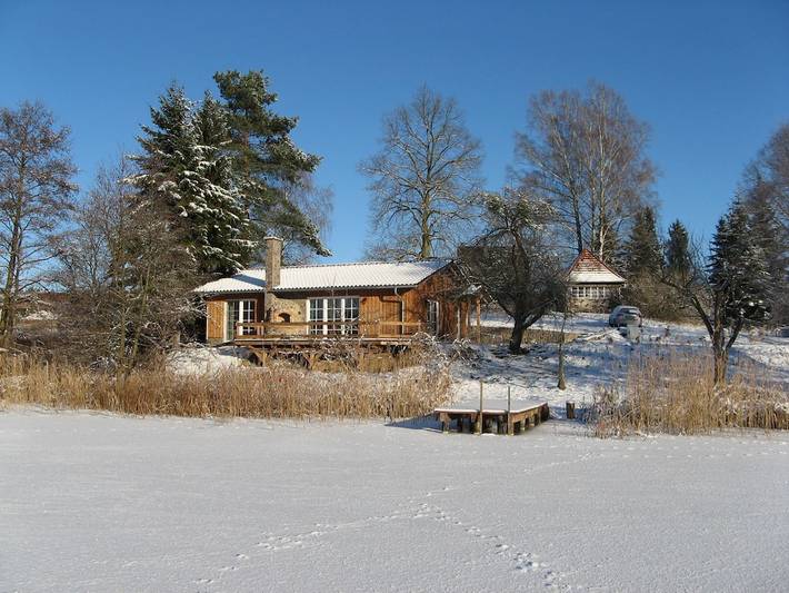 Ferienhaus für 4 Personen, mit Terrasse und Garten sowie Seeblick in Wokuhl-Dabelow